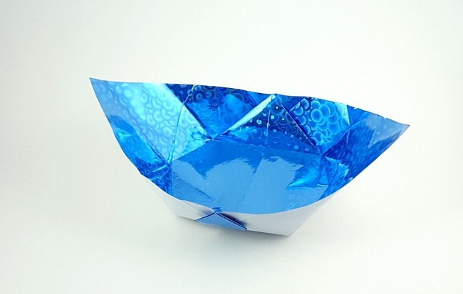 Origami Flood bowl by Nick Robinson. Folded from a square of holographic paper by Gilad Aharoni on giladorigami.com