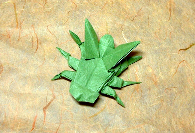 Origami Fly by John Montroll. Folded from a square of Vietnamese wrapping-paper by Gilad Aharoni on giladorigami.com