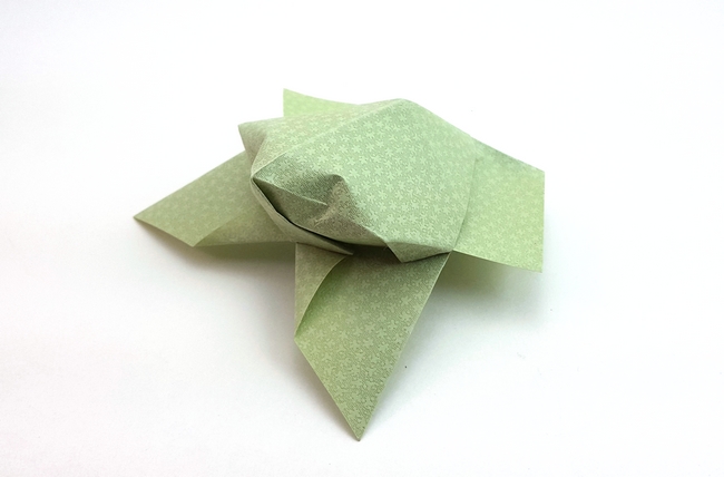 Origami Frog by Nick Robinson. Folded from a square of textured origami paper by Gilad Aharoni on giladorigami.com