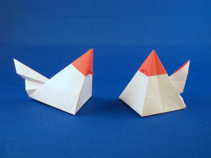 Origami Hens - geometric by Roman Diaz. Each folded from a square of origami paper by Gilad Aharoni on giladorigami.com