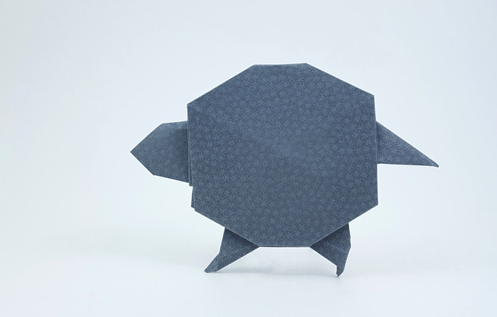 Origami Glyptodon by Andres Troya. Folded from a square of textured origami paper by Gilad Aharoni on giladorigami.com