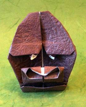Origami Gorilla mask by Kunihiko Kasahara. Folded from a square of momigami by Gilad Aharoni on giladorigami.com