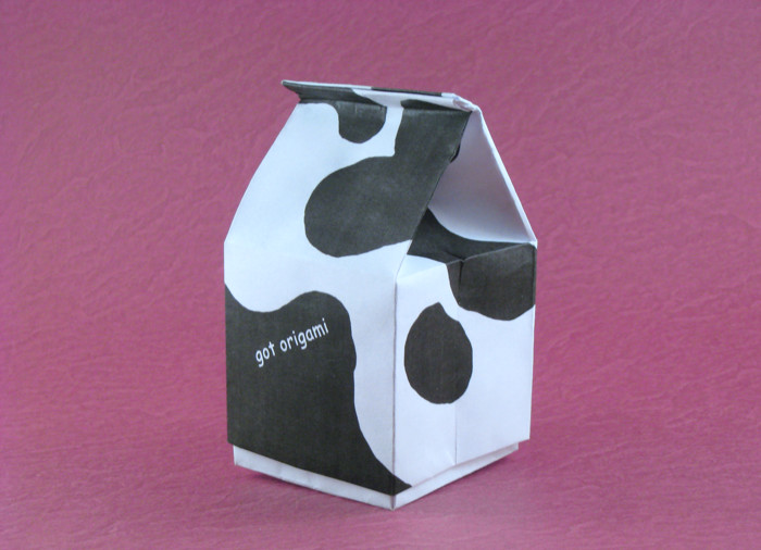 Origami Milk carton by Makoto Yamaguchi. Lid folded from a rectangle of printing paper designed by Patty Grodner. Box folded from a square of printing paper by Gilad Aharoni on giladorigami.com