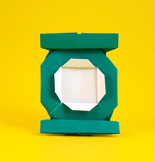 Origami Green Lantern symbol by John Montroll. Folded from a square of origami paper by Gilad Aharoni on giladorigami.com