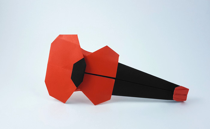 Origami Guitar by Marc Kirschenbaum. Folded from a square of Duo origami paper by Gilad Aharoni on giladorigami.com