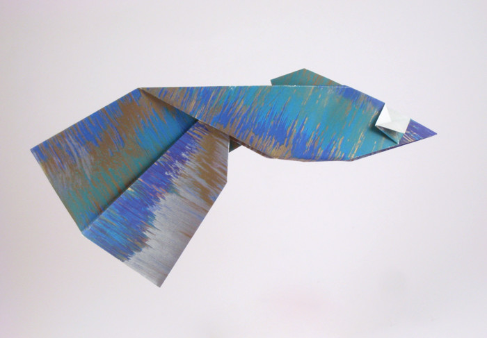 Origami Guppy by Makoto Yamaguchi. Folded from a square of decorative origami paper by Gilad Aharoni on giladorigami.com