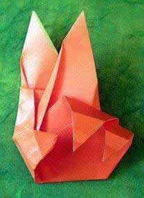 Origami Hands making sign-language by Kunihiko Kasahara. Folded from a square or origami paper by Gilad Aharoni on giladorigami.com