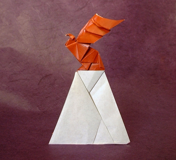 Origami Hawk on a rock by Seiji Nishikawa. Folded from a square of origami paper by Gilad Aharoni on giladorigami.com