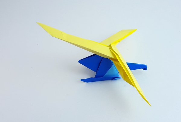 Origami Helicopter by Kimura Yoshihisa. Folded from 2 triangles of origami paper by Gilad Aharoni on giladorigami.com