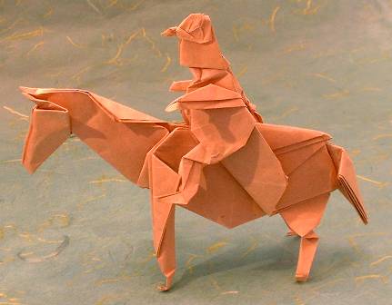 Origami Horse with rider by John Montroll. Folded from a square of thin brown wrapping paper by Gilad Aharoni on giladorigami.com