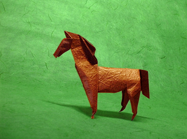 Origami Horse by John Montroll. Folded from a square of Vietnamese wrapping-paper by Gilad Aharoni on giladorigami.com