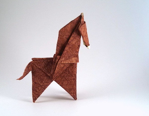Origami Horse by Seo Won Seon (Redpaper). Folded from a square of Tea Stained Leather scrapbooking paper by Gilad Aharoni on giladorigami.com
