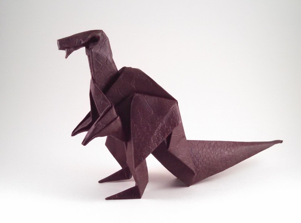 Origami Iguanodon by Akira Yoshizawa. Folded from a square of reptile dark brown scrapbooking paper by Gilad Aharoni on giladorigami.com