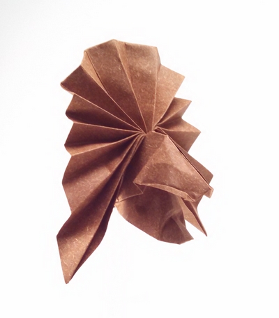 Origami Sioux Indian by Milada Bla'hova. Folded from a square of speckle-design origami paper by Gilad Aharoni on giladorigami.com
