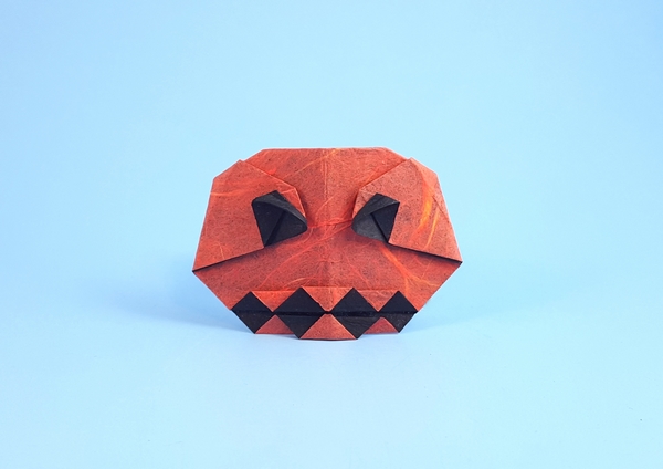 Origami Jack-o'-lantern by Christophe Boudias. Folded from a square of double-sided Unryu paper by Gilad Aharoni on giladorigami.com