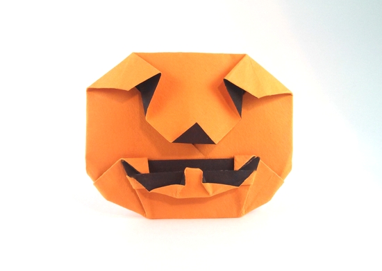Origami Jack-o'-lantern by Sy Chen. Folded from a square of watercolor paper by Gilad Aharoni on giladorigami.com