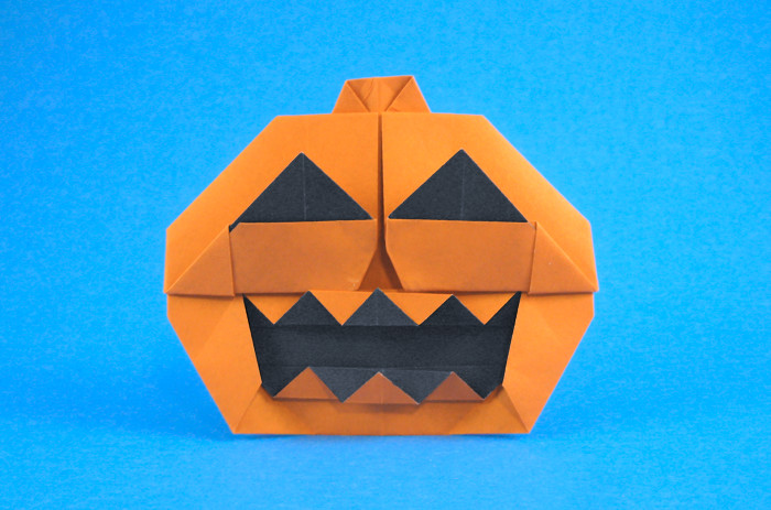 Origami Jack-o'-lantern by Jun Maekawa. Folded from a square of duo origami paper by Gilad Aharoni on giladorigami.com