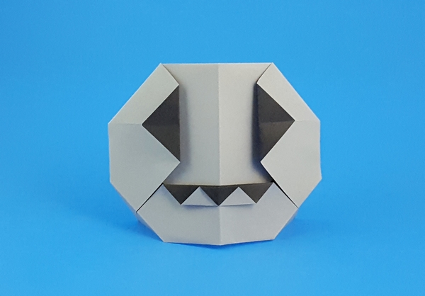 Origami Jack-o'-lantern by Stephane Gigandet. Folded from a suqare of duo origami paper by Gilad Aharoni on giladorigami.com