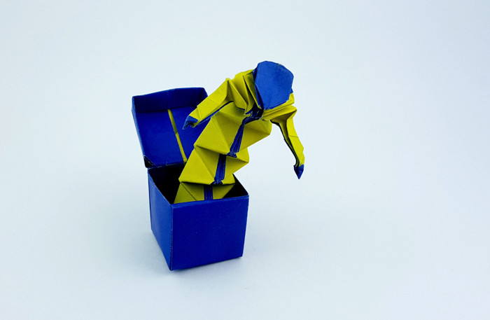 Origami Jack-in-the-box by Max Hulme. Folded from a rectangle od duo origami paper by Gilad Aharoni on giladorigami.com