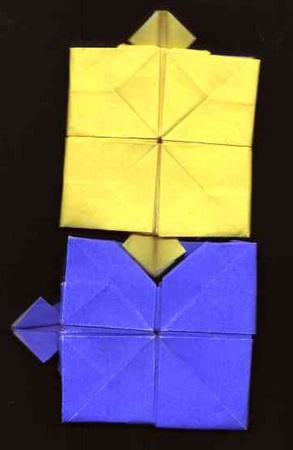 Origami Jigsaw piece by Tony O'Hare. Folded by Gilad Aharoni on giladorigami.com