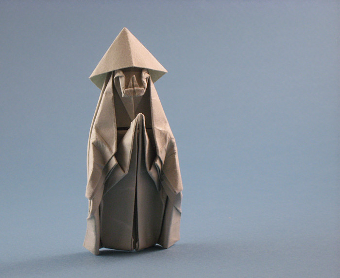 Origami Stone statue of Jizo wearing a shade by Kawai Toyoaki. Wet-folded from a square of art paper by Gilad Aharoni on giladorigami.com