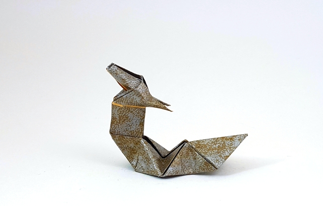 Origami Eastern dragon by Kunihiko Kasahara. Folded from a square of scrapbooking paper by Gilad Aharoni on giladorigami.com
