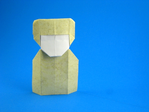 Origami Lady No.1 by David Petty. Folded from a rectangle of scrapbooking paper by Gilad Aharoni on giladorigami.com