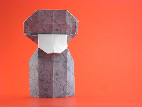 Origami Lady No.2 by David Petty. Folded from a rectangle of scrapbooking paper by Gilad Aharoni on giladorigami.com