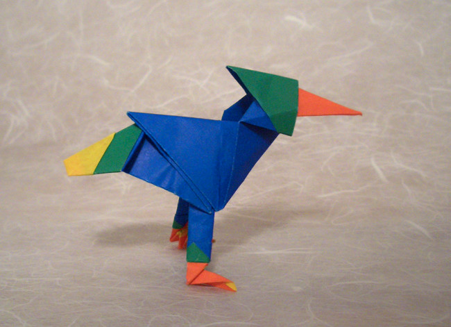 Origami Multi-layered bird by Nicolas Terry. Folded from 2 squares of duo origami paper by Gilad Aharoni on giladorigami.com