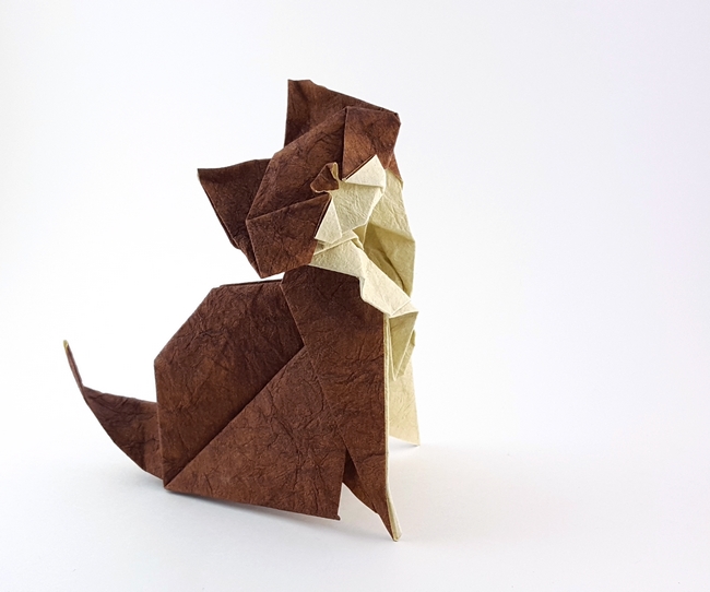 Origami Maine coon by Roman Diaz. Folded from a square of Tea Stained Leather scrapbooking paper by Gilad Aharoni on giladorigami.com