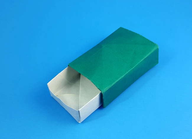 Origami Matchbox by Marc Kirschenbaum. Folded from a square of origami paper by Gilad Aharoni on giladorigami.com