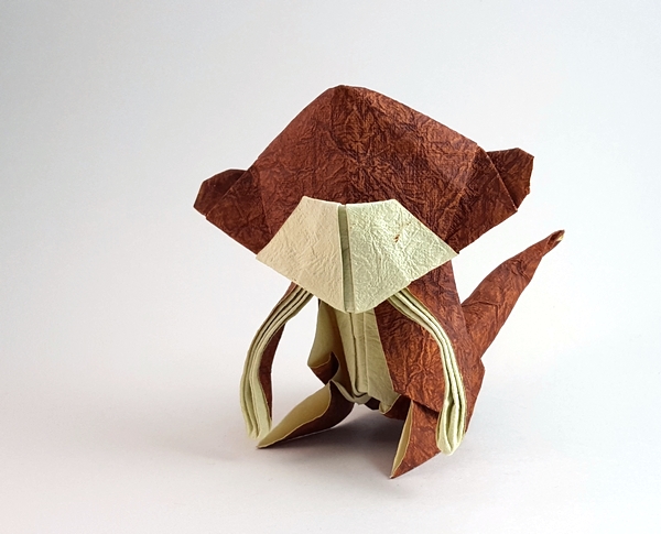 Origami Monkey by Enrique Martinez. Wet folded from a square of Tea Stained Leather scrapbooking paper by Gilad Aharoni on giladorigami.com