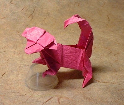 Origami Monkey by John Montroll. Folded from a square of Vietnamese wrapping-paper by Gilad Aharoni on giladorigami.com