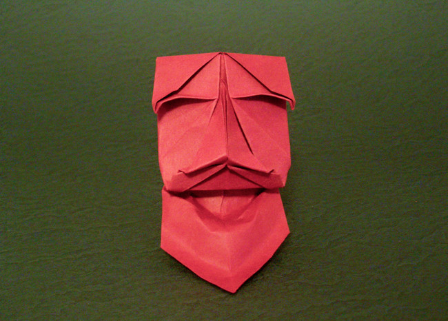 Origami Grinning old man mask by Kunihiko Kasahara. Wet-folded from a square of art paper by Gilad Aharoni on giladorigami.com