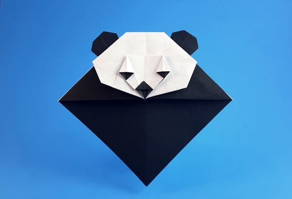 Origami Panda bookmark by Quentin Trollip. Folded from a square of origami paper by Gilad Aharoni on giladorigami.com
