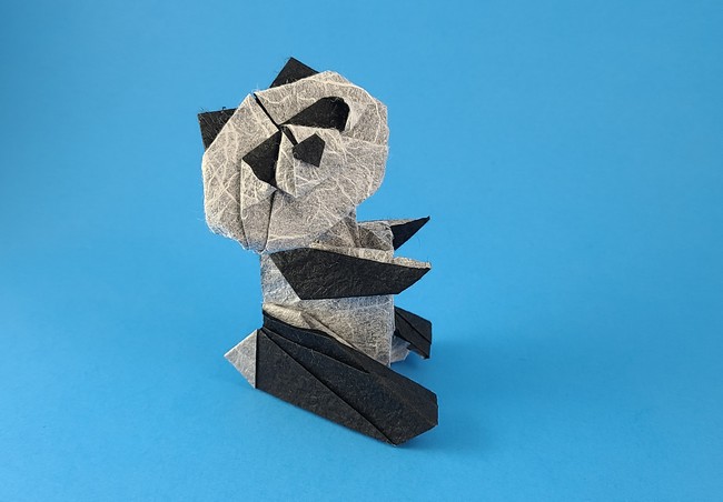 Origami Panda by Oriol Esteve. Folded from a square of Duo-Thai origami paper by Gilad Aharoni on giladorigami.com