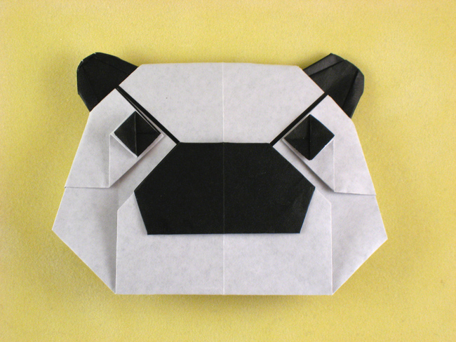 Origami Panda mask by Juan Gimeno. Folded from a square of origami paper by Gilad Aharoni on giladorigami.com