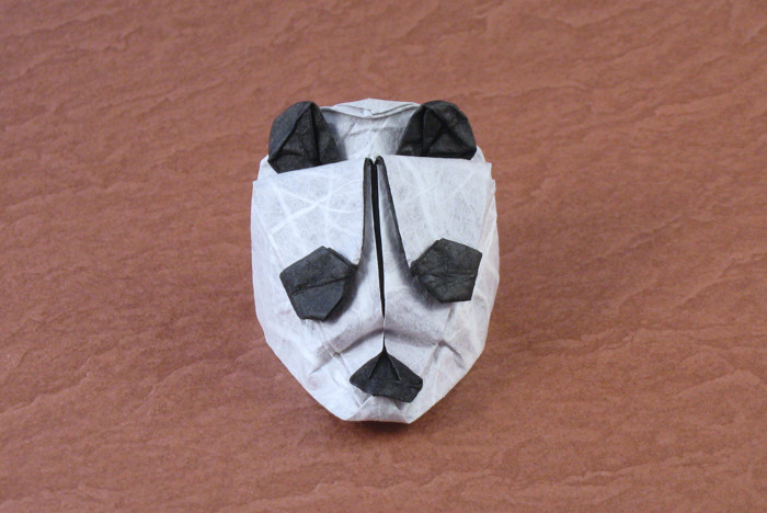 Origami Panda mask by Max Hulme. Folded from a square of double-sided Unryu paper by Gilad Aharoni on giladorigami.com