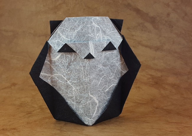 Origami Panda by Michael G. LaFosse. Folded from a square of Duo Thai paper by Gilad Aharoni on giladorigami.com
