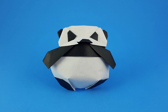Origami Panda by Federico Scalambra. Folded from a square and triangle of origami paper by Gilad Aharoni on giladorigami.com