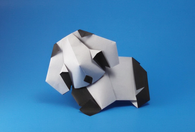 Origami Panda by Katrin and Yuri Shumakov. Folded from 2 squares and a rectangle of origami paper by Gilad Aharoni on giladorigami.com