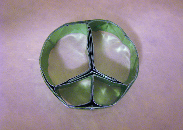Origami Peace symbol by Wensdy Whitehead. Folded from a square of American foil by Gilad Aharoni on giladorigami.com
