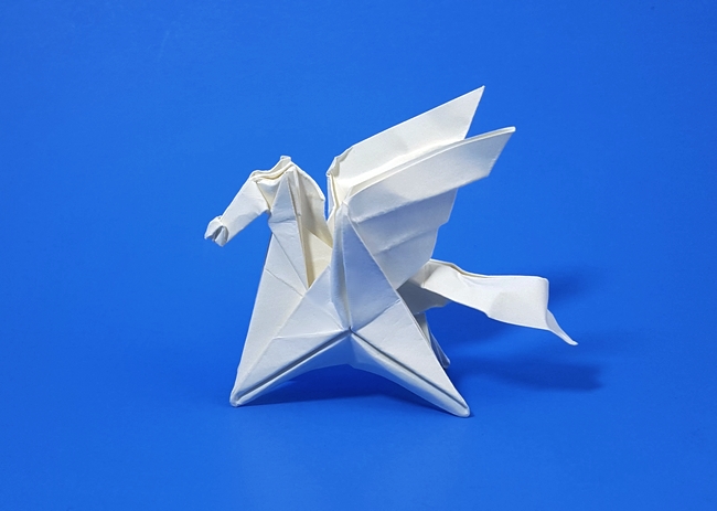 Origami Pegasus by Paul Frasco. Wet folded from a square of paper provided in the kit by Gilad Aharoni on giladorigami.com