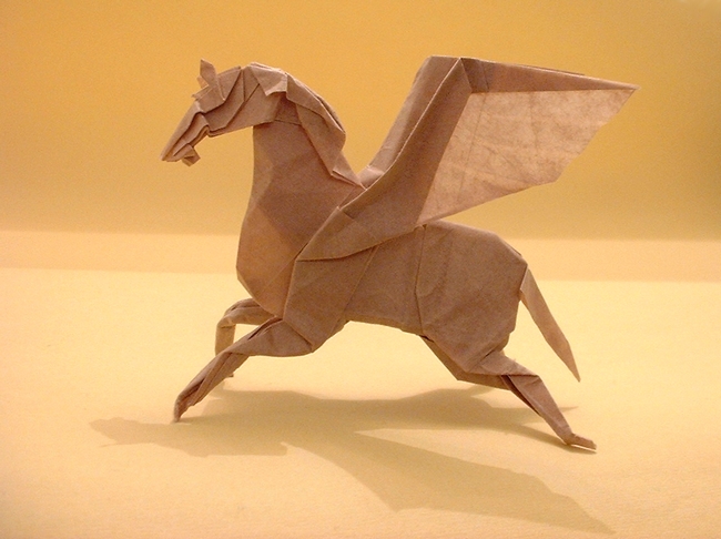 Origami Pegasus by Fumiaki Kawahata. Folded from a square of thin brown wrapping paper by Gilad Aharoni on giladorigami.com