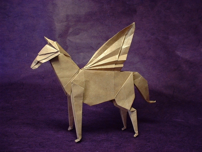 Origami Pegasus by John Montroll. Folded from a square of thin brown wrapping paper by Gilad Aharoni on giladorigami.com