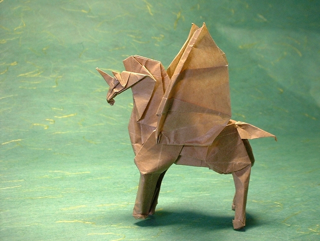 Origami Pegasus with Unicorn by Fumiaki Kawahata. Folded from a square of thin brown wrapping paper by Gilad Aharoni on giladorigami.com