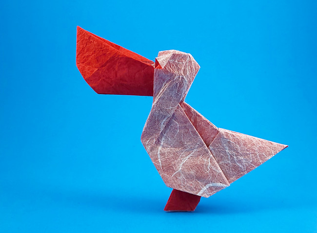 Origami Pelican by Jiahui Li (Syn). Folded from a square of Duo Thai origami paper by Gilad Aharoni on giladorigami.com