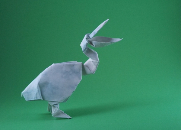 Origami Pelican by Akira Yoshizawa. Wet-folded from a diamond of Royal Marble cardstock by Gilad Aharoni on giladorigami.com