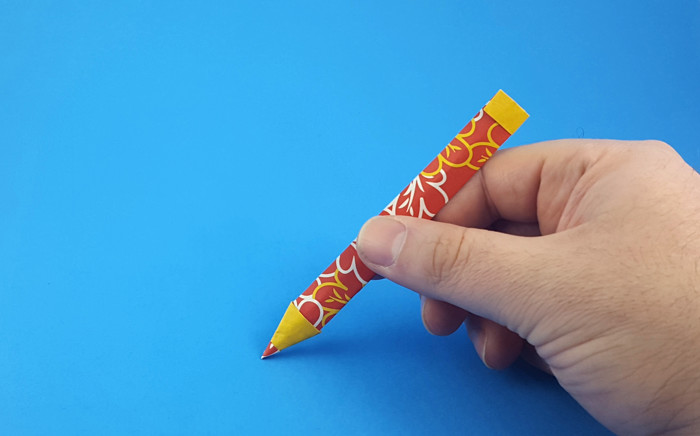 Origami Pencil with eraser by Vicente Palacios. Folded from a rectangle of duo origami paper by Gilad Aharoni on giladorigami.com