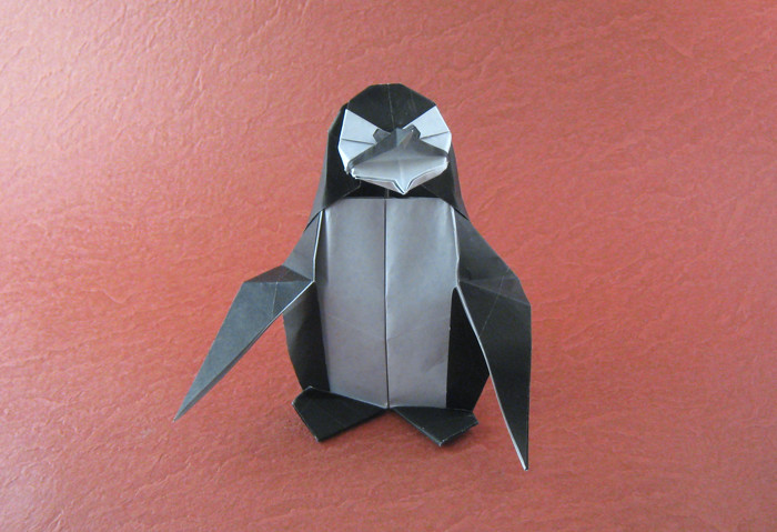 Origami Penguin by Fernando Gilgado Gomez. Folded from a square of origami paper by Gilad Aharoni on giladorigami.com